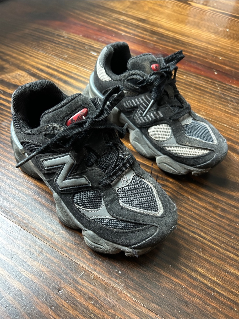 New Balance 9060 Black and Gray Kids' Athletic Sneakers with Red Accent